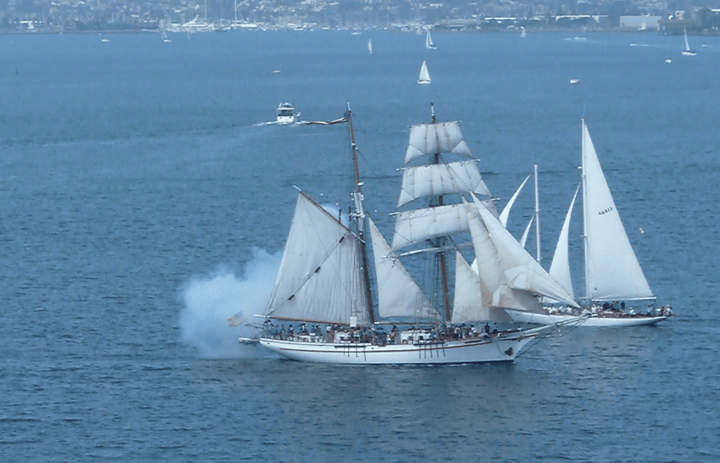 Many ships emitting clouds of smoke