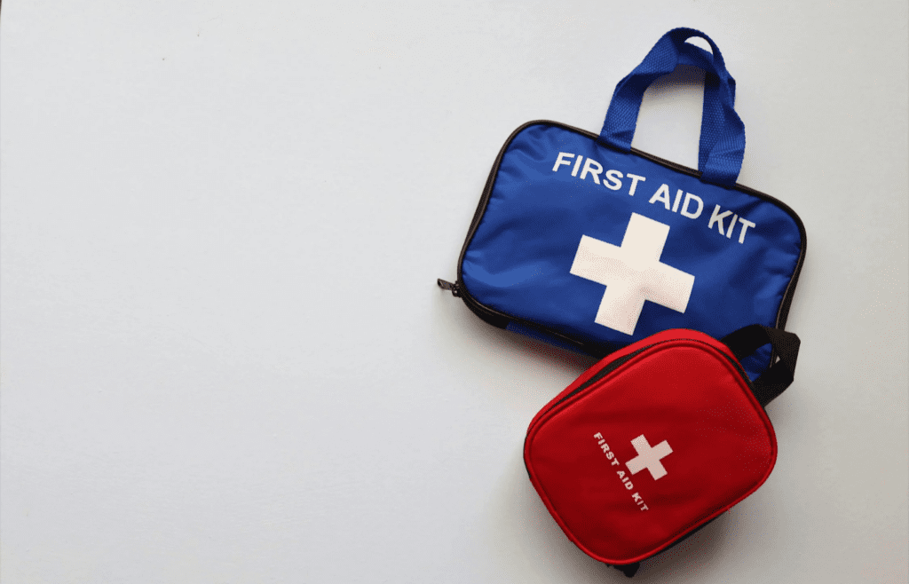 Red and blue travel-sized first aid kits