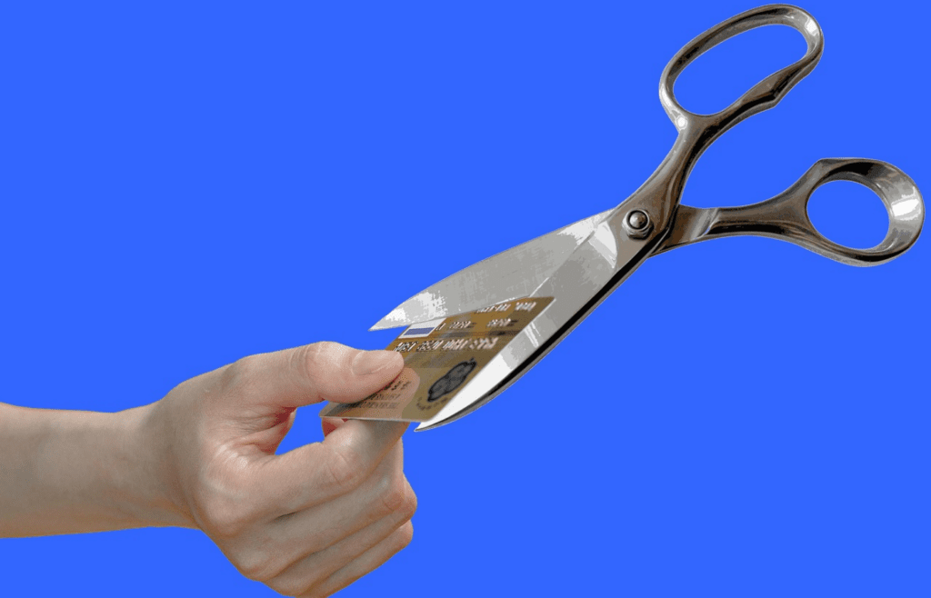 Scissor cutting a credit card