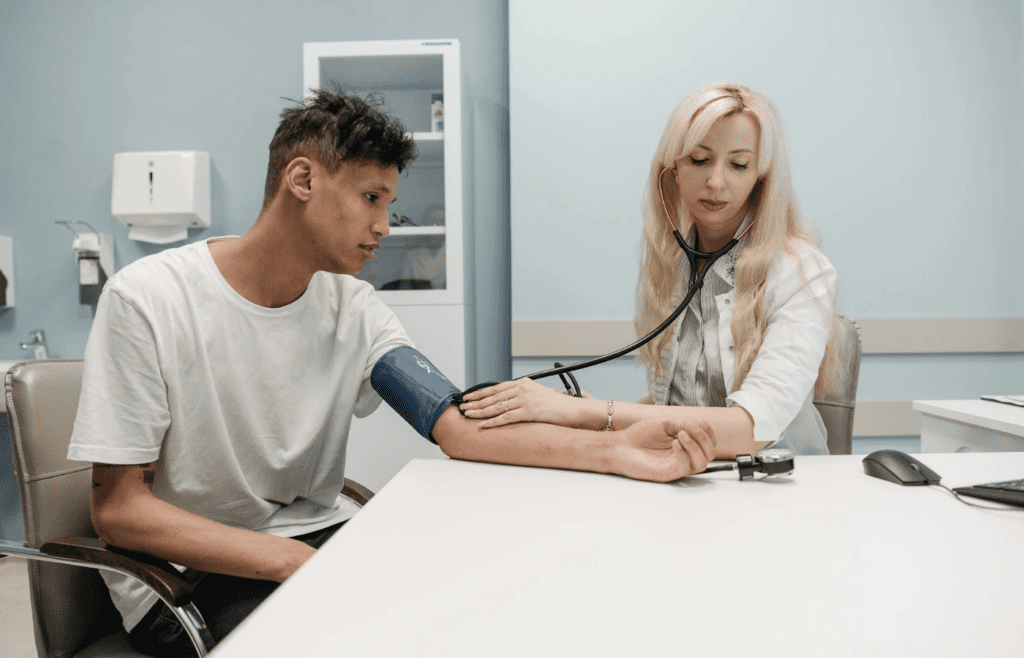 Calm patient during routine vitals examination