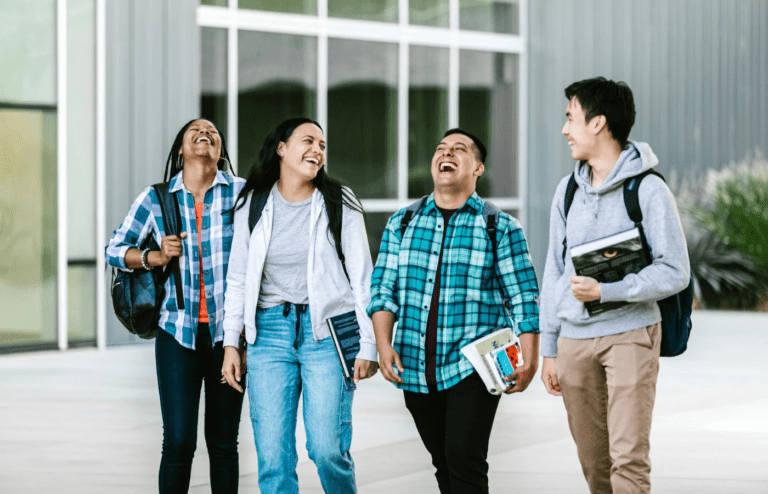 Group of Students Walking and Laughing Together