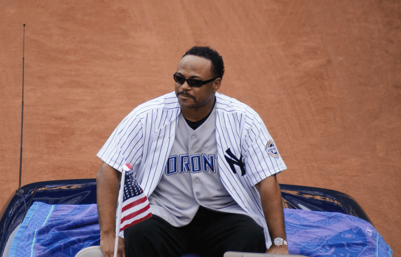 Rickey Henderson wearing Yankees jerseys