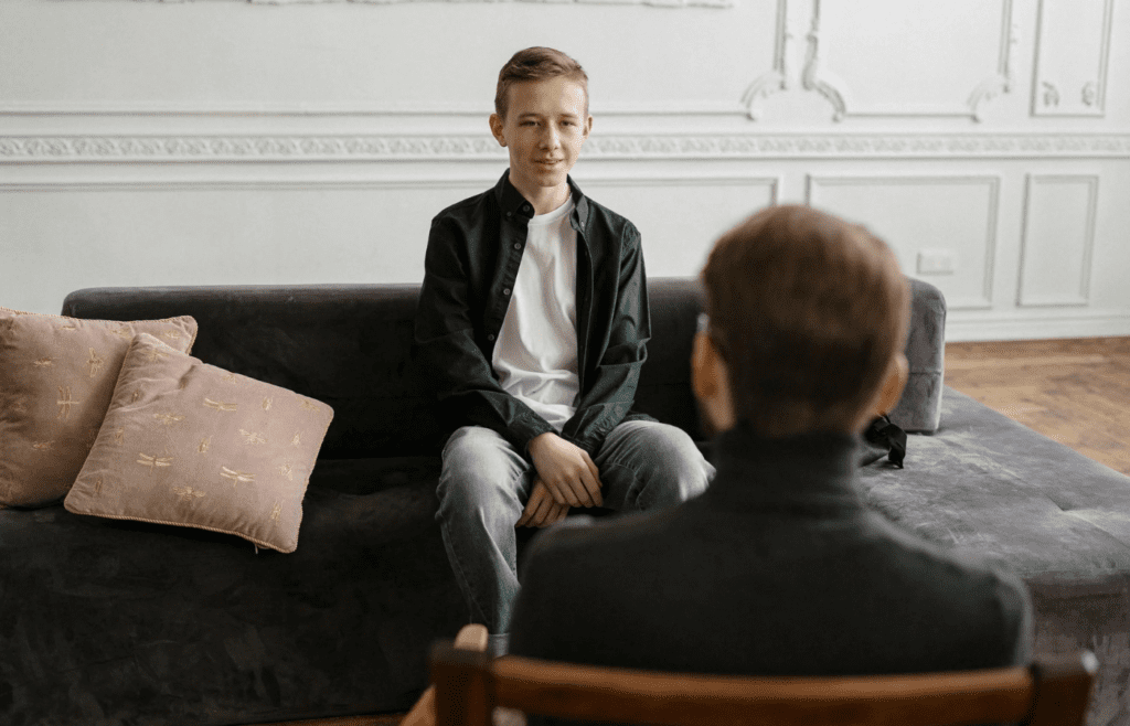 Teen speaks with counselor about future career