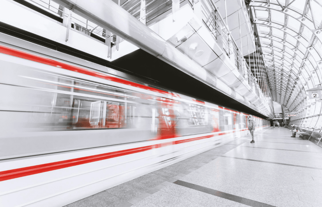 Modern high-speed train in sleek tunnel station