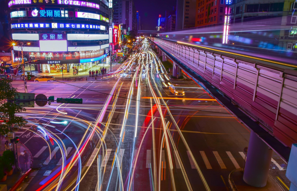 Busy city intersection with smart traffic lights