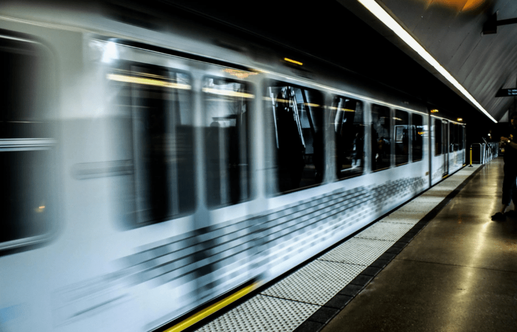 High-tech hover train passing by platform