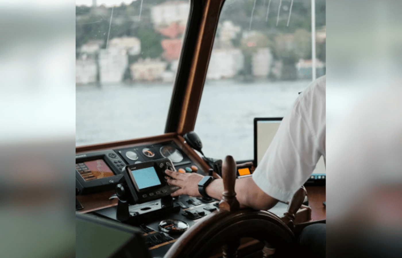 Modern ship control panel with digital screens
