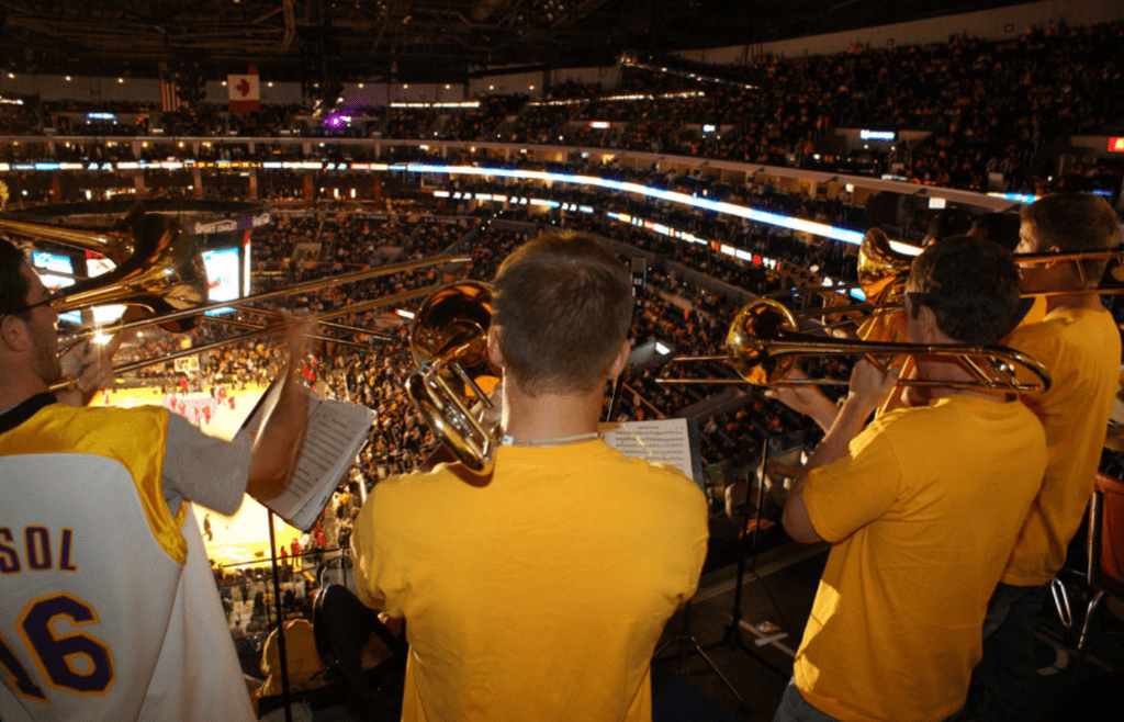 Los Angeles Lakers Fans play instruments at game