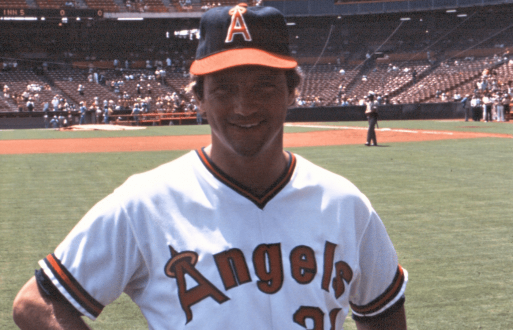 Ken Brett Baseball player in Angels uniform posing on the field before a game