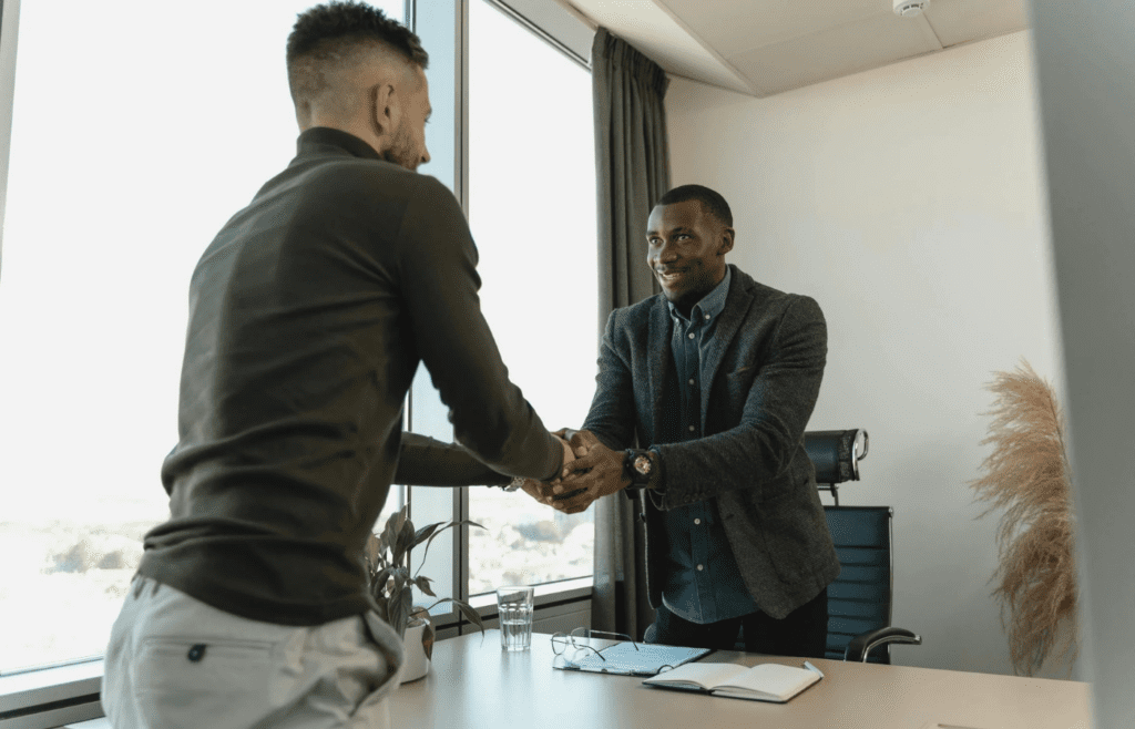 Boss welcomes new hire with power play smile