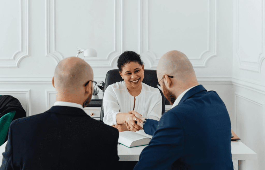 Boss smiling warmly while favoring one employee
