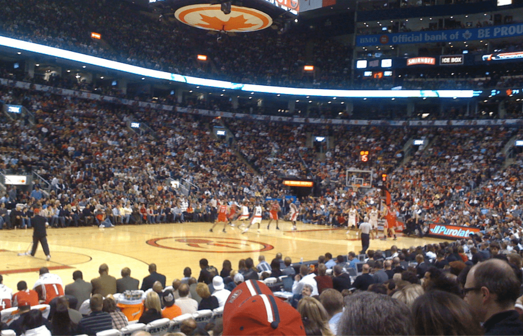 Crowd of Rockets fans cheering during NBA game