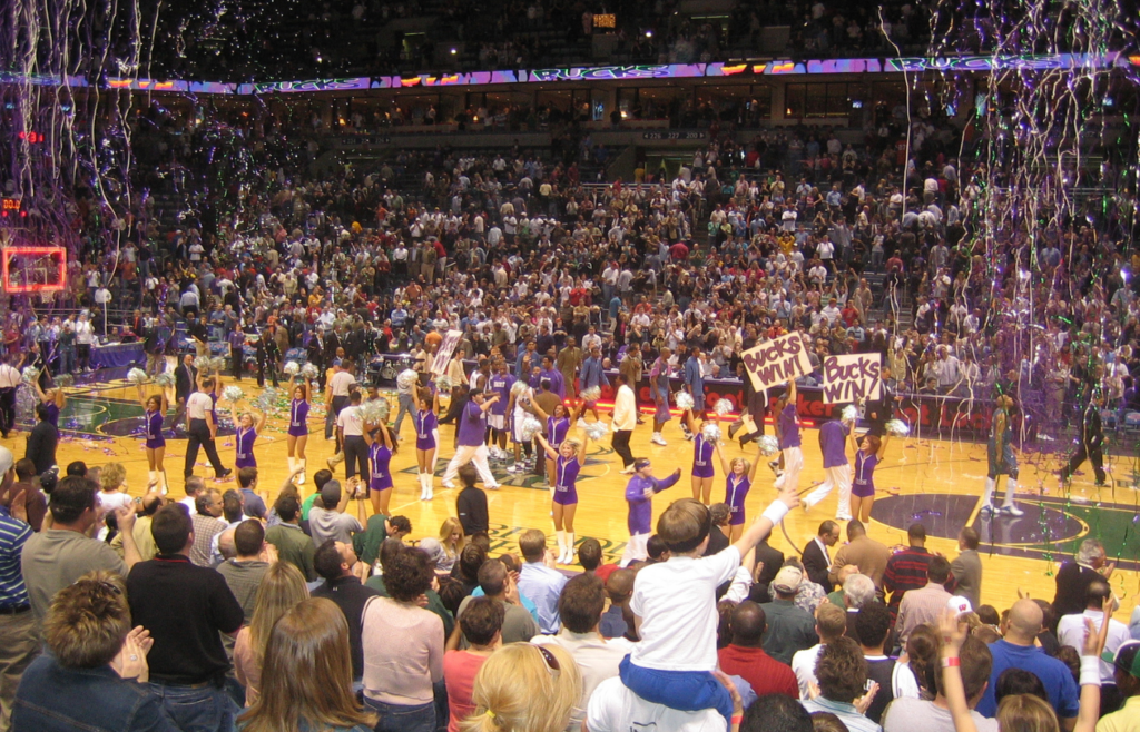 Milwaukee Bucks fans celebrate victory in packed stadium