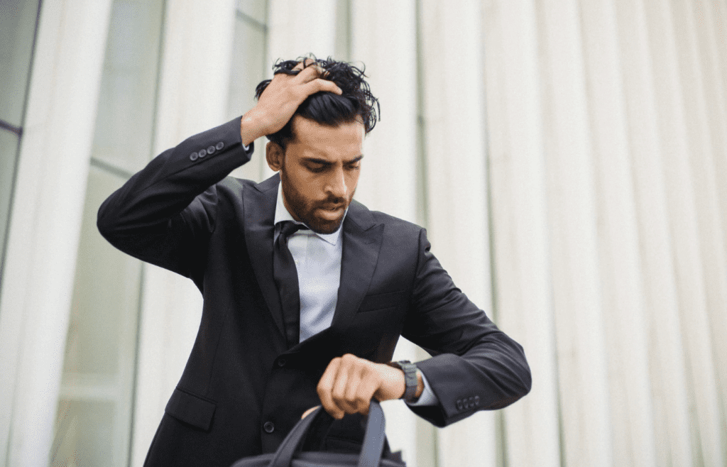 Bearded man rushing, late for office meeting