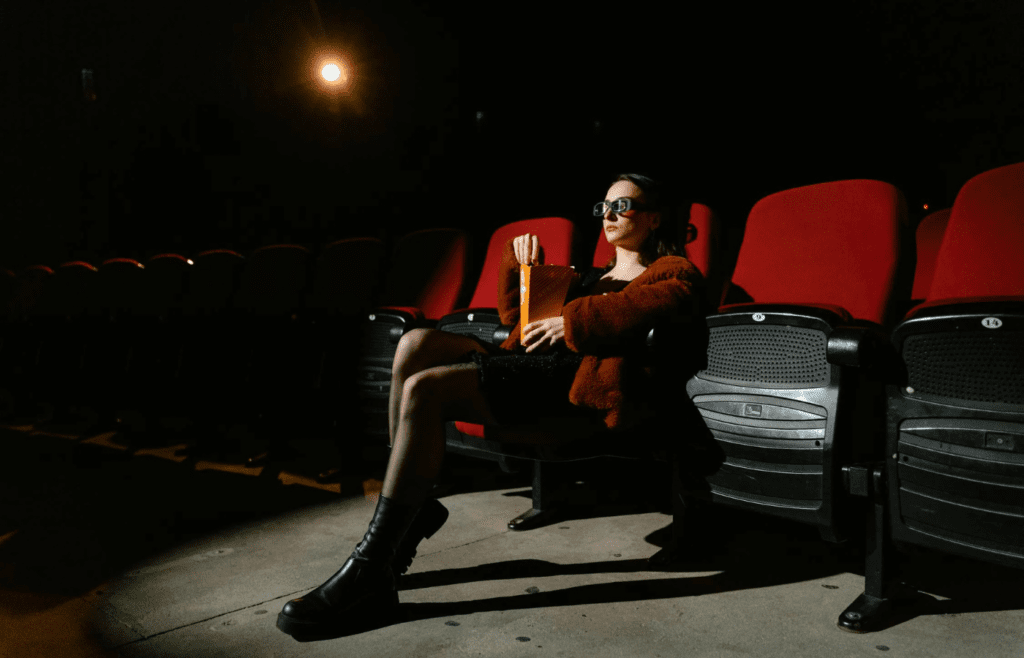A person bouncing their leg while seated or staring blankly at a screen