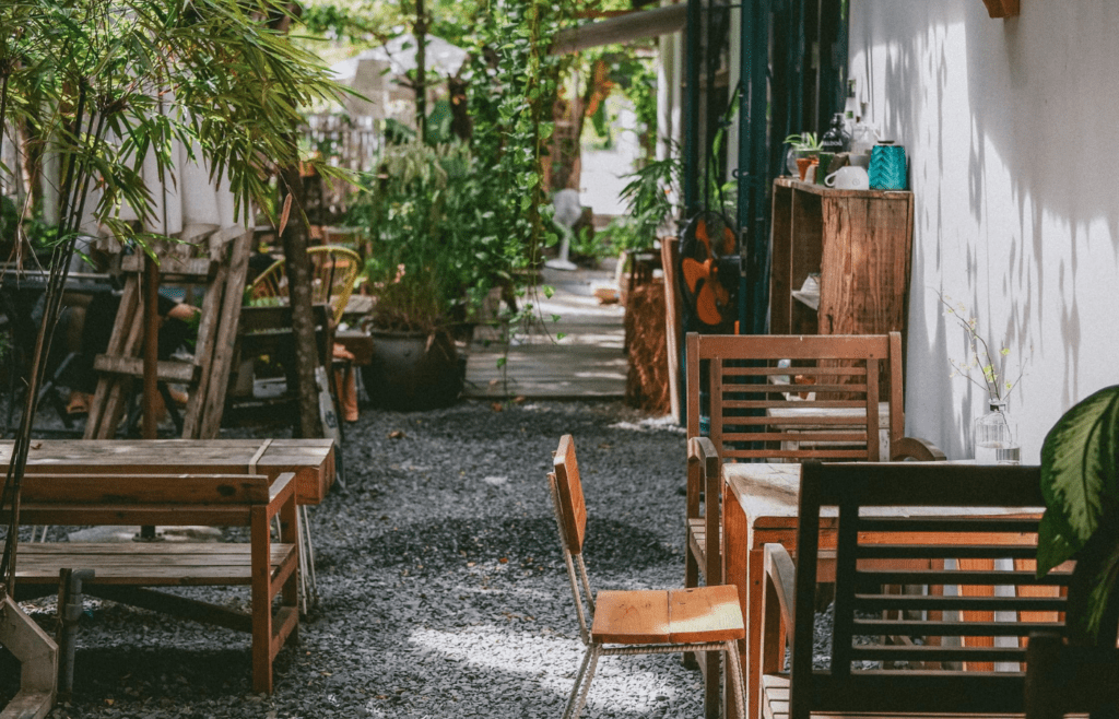 A charming gravel path winding through a backyard