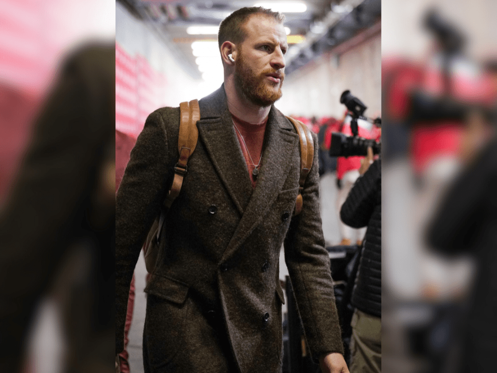 Jan 18, 2025; Kansas City, Missouri, USA; Kansas City Chiefs quarterback Carson Wentz (11) enters the stadium against the Houston Texans prior to a 2025 AFC divisional round game at GEHA Field at Arrowhead Stadium.