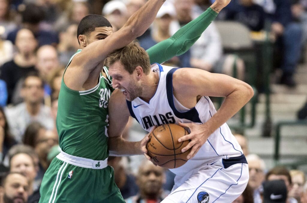 Nov 20, 2017; Dallas, TX, USA; Boston Celtics forward Jayson Tatum (0) defends against Dallas Mavericks forward Dirk Nowitzki (41) during the first quarter at the American Airlines Center. Mandatory Credit: Jerome Miron-USA TODAY Sports