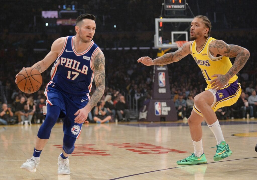 January 29, 2019; Los Angeles, CA, USA; Philadelphia 76ers guard JJ Redick (17) moves the ball against Los Angeles Lakers forward Michael Beasley (11) during the first half at Staples Center.