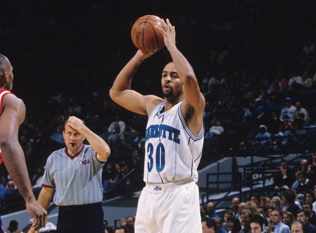 Mar 18, 1997; Charlotte, NC, USA; FILE PHOTO; Charlotte Hornets shooting guard Dell Curry (30) in action against the Philadelphia 76ers at the Charlotte Coliseum. Mandatory Credit: RVR Photos-USA TODAY Sports