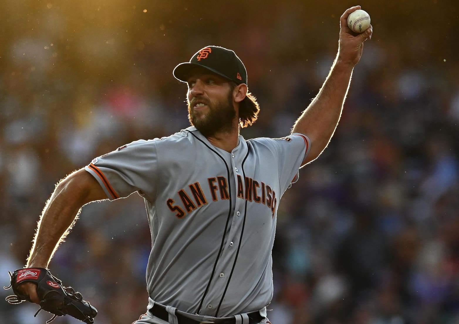 Aug 3, 2019; Denver, CO, USA; San Francisco Giants starting pitcher Madison Bumgarner (40) delivers a pitch in the fourth inning against the Colorado Rockies at Coors Field. Mandatory Credit: Ron Chenoy-USA TODAY Sports