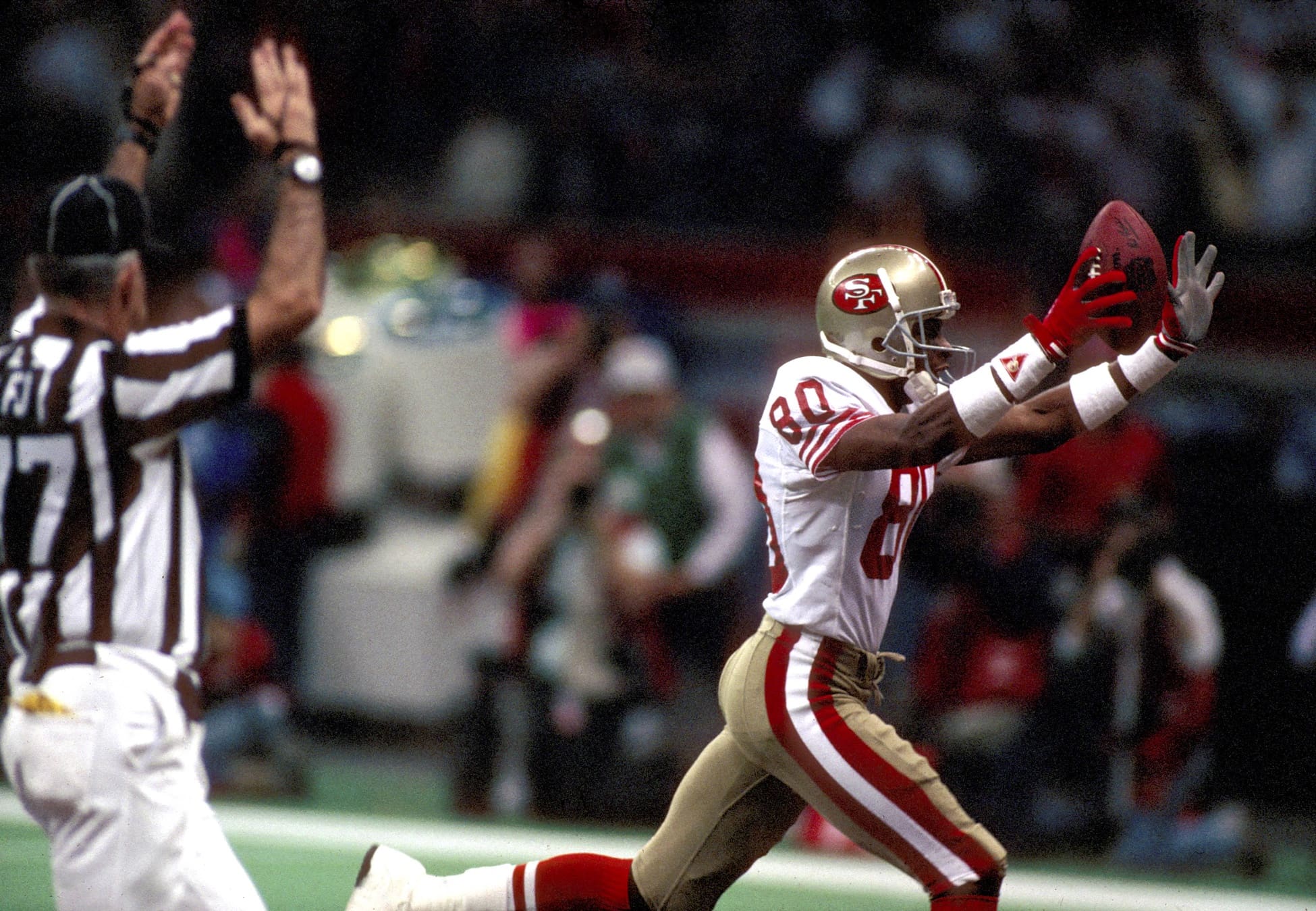 Jan 28, 1990; New Orleans, LA, USA; FILE PHOTO; San Francisco 49ers Receiver#80 JERRY RICE in action during Super Bowl XXIV against the Denver Broncos at the Superdome. The 49ers defeated the Broncos 55-10.Mandatory Credit: Photo By USA TODAY Sports © Copyright 1990 USA TODAY Sports