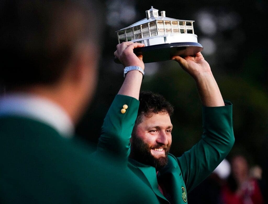 2022 Masters champion Jon Rahm holds up the trophy after the final round of The Masters golf tournament on Apr 9, 2023.
