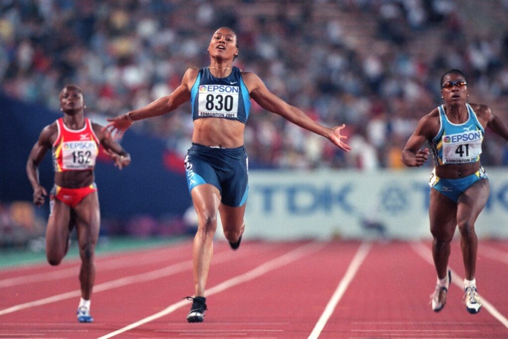 Aug 10, 2001; Edmonton, Alberta, CAN; Marion Jones (USA) wins the 200 meters in the 8th IAAF World Championships in Athletics at Commonwealth Stadium. Mandatory Credit: Kirby Lee/Image of Sport-USA TODAY Sports