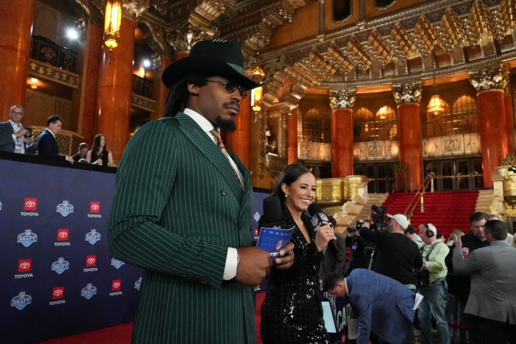 Apr 25, 2024; Detroit, MI, USA; Former NFL quarterback Cam Newton and broadcaster Kaylee Hartung stand on the red carpet ahead of the 2024 NFL Draft at Detroit’s Fox Theatre. Mandatory Credit: Kirby Lee-USA TODAY Sports