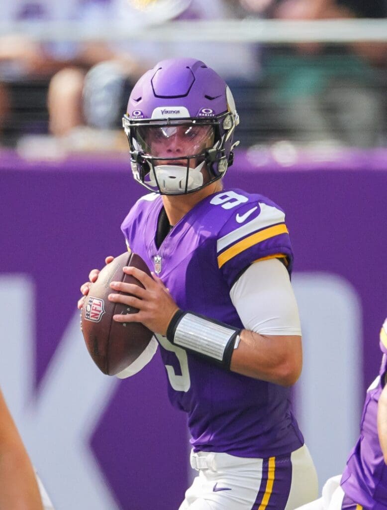 Aug 10, 2024; Minneapolis, Minnesota, USA; Minnesota Vikings quarterback J.J. McCarthy (9) drops back to pass against the Las Vegas Raiders in the third quarter at U.S. Bank Stadium. Mandatory Credit: Brad Rempel-Imagn Images