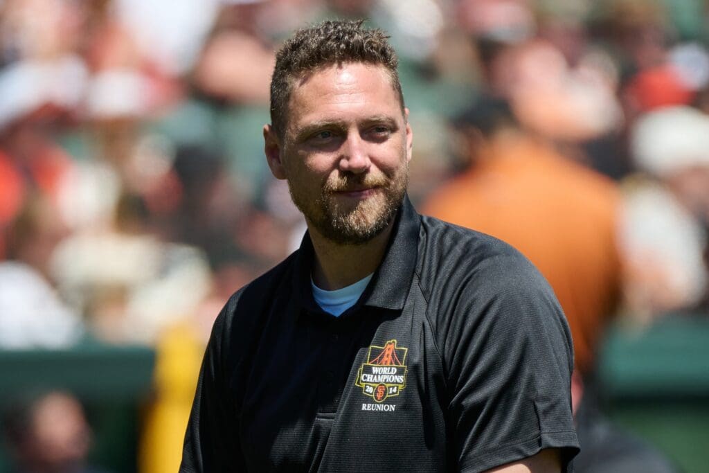 Aug 10, 2024; San Francisco, California, USA; Former San Francisco Giants outfielder Hunter Pence listens during a ceremony celebrating the tenth anniversary of the Giants' 2014 World Series championship at Oracle Park.