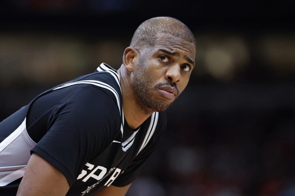 Jan 6, 2025; Chicago, Illinois, USA; San Antonio Spurs guard Chris Paul (3) looks on during the second half at United Center. Mandatory Credit: Kamil Krzaczynski-Imagn Images