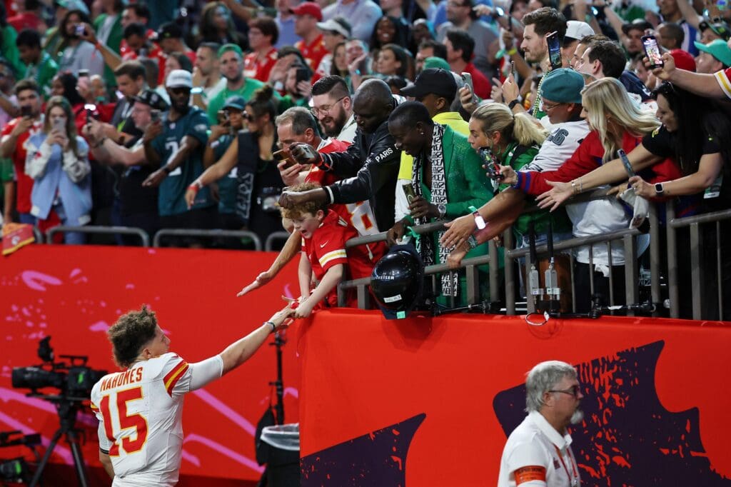Feb 9, 2025; New Orleans, LA, USA; Kansas City Chiefs quarterback Patrick Mahomes (15) greets fans as he walks off the field after losing against the Philadelphia Eagles in Super Bowl LIX at Caesars Superdome. Mandatory Credit: Bill Streicher-Imagn Images