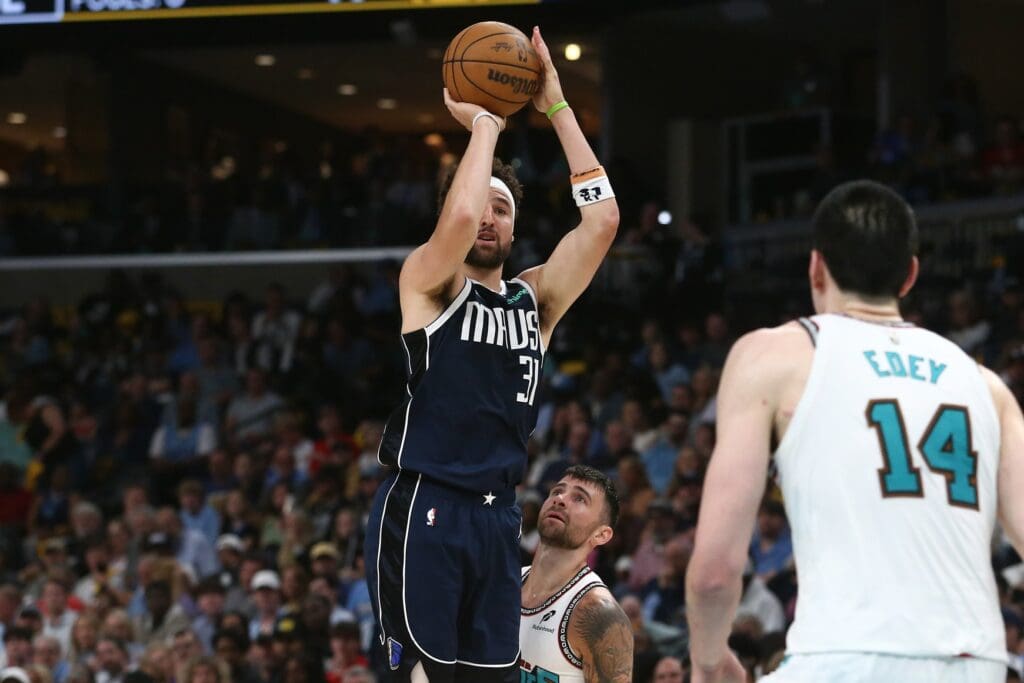 Apr 18, 2025; Memphis, Tennessee, USA; Dallas Mavericks guard Klay Thompson (31) shoots for three during the second quarter against the Memphis Grizzlies at FedExForum. Mandatory Credit: Petre Thomas-Imagn Images