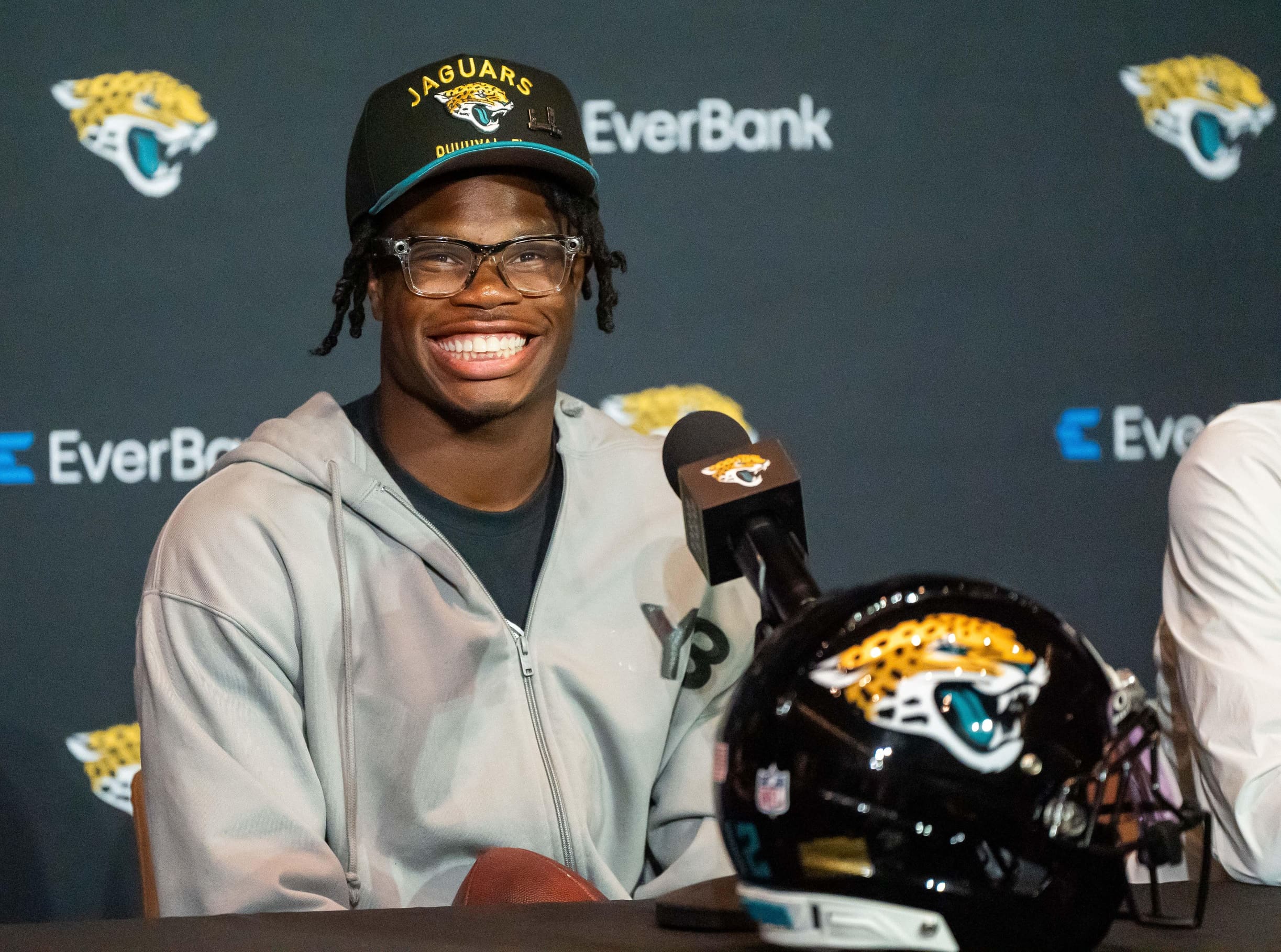 The Jacksonville Jaguars’ first-round pick, Colorado Buffaloes wide receiver and defensive back Travis Hunter, flashes his wide smile during a press conference Friday, March 25, 2025 at Miller Electric Center in Jacksonville, Fla. [Doug Engle/Florida Times-Union]