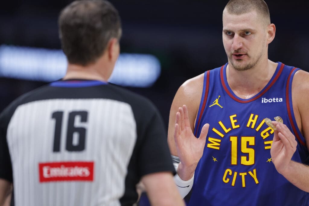 May 13, 2025; Oklahoma City, Oklahoma, USA; Denver Nuggets center Nikola Jokic (15) talks to an official after a play against the Oklahoma City Thunder during the second half of game five of the second round for the 2025 NBA Playoffs at Paycom Center.