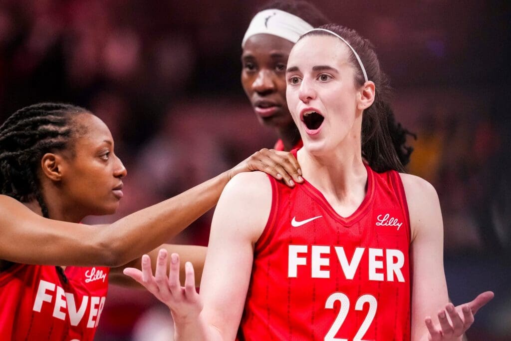 Indiana Fever guard Caitlin Clark (22) reacts to receiving a flagrant foul Saturday, May 17, 2025, during a game between the Indiana Fever and the Chicago Sky at Gainbridge Fieldhouse in Indianapolis. The Indiana Fever defeated the Chicago Sky, 93-58.