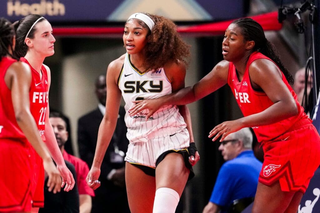 Chicago Sky forward Angel Reese (5) reacts to a flagrant foul from Indiana Fever guard Caitlin Clark (22) on Saturday, May 17, 2025, during a game between the Indiana Fever and the Chicago Sky at Gainbridge Fieldhouse in Indianapolis.