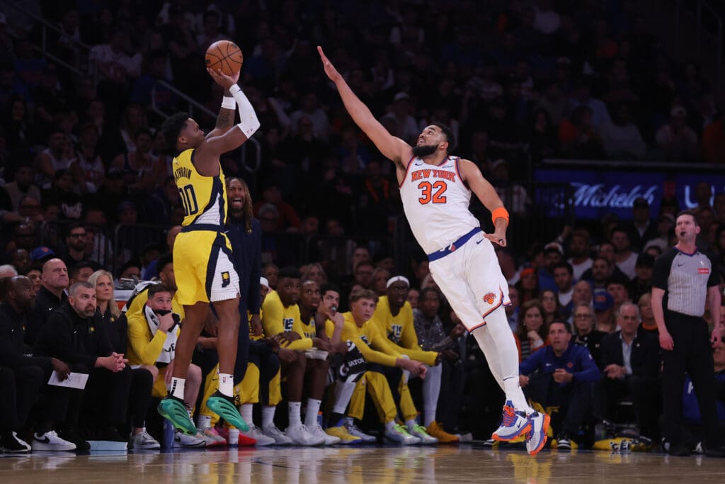 May 21, 2025; New York, New York, USA; Indiana Pacers guard Bennedict Mathurin (00) shoots against New York Knicks center Karl-Anthony Towns (32) in the third quarter during game one of the eastern conference finals for the 2025 NBA Playoffs at Madison Square Garden.