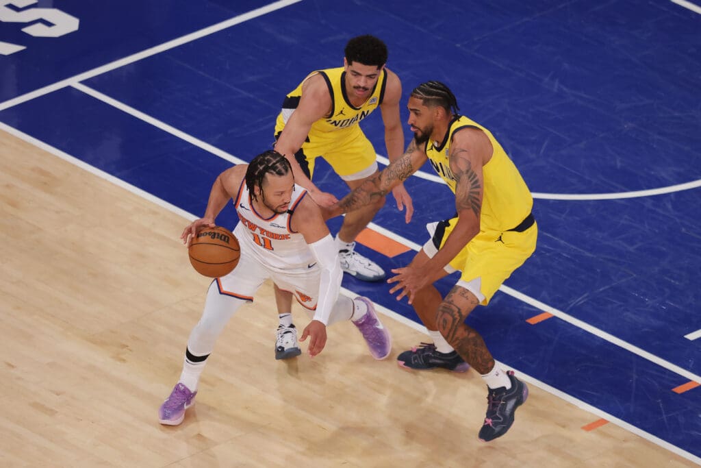May 21, 2025; New York, New York, USA; New York Knicks guard Jalen Brunson (11) controls the ball against Indiana Pacers forward Obi Toppin (1) in the fourth quarter during game one of the eastern conference finals for the 2025 NBA Playoffs at Madison Square Garden.