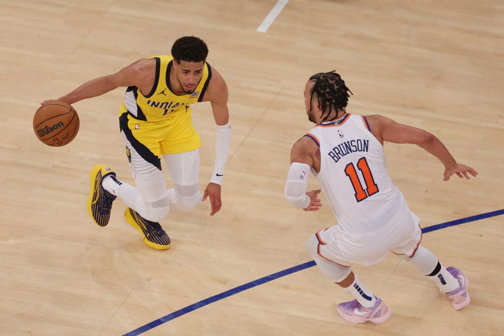 May 21, 2025; New York, New York, USA; Indiana Pacers guard Tyrese Haliburton (0) controls the ball against New York Knicks guard Jalen Brunson (11) in overtime during game one of the eastern conference finals for the 2025 NBA Playoffs at Madison Square Garden.