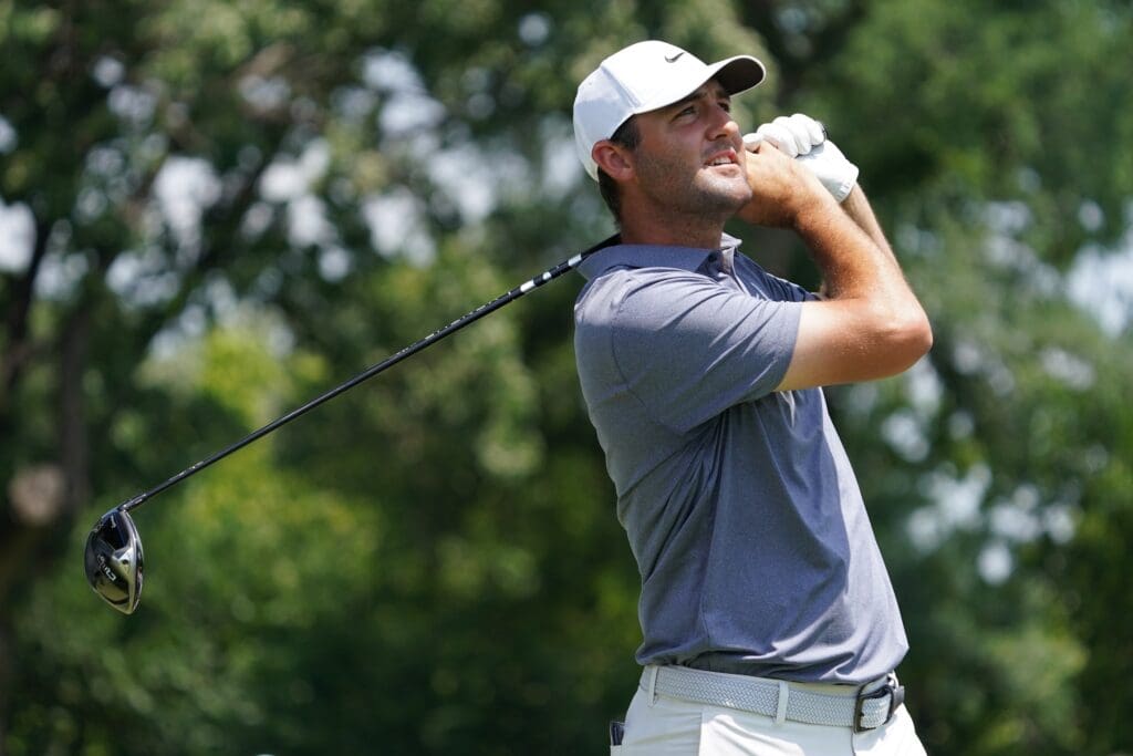 May 25, 2025; Fort Worth, Texas, USA; Scottie Scheffler watches his shot from the third tee during the final round of the Charles Schwab Challenge golf tournament. Mandatory Credit: Raymond Carlin III-Imagn Images
