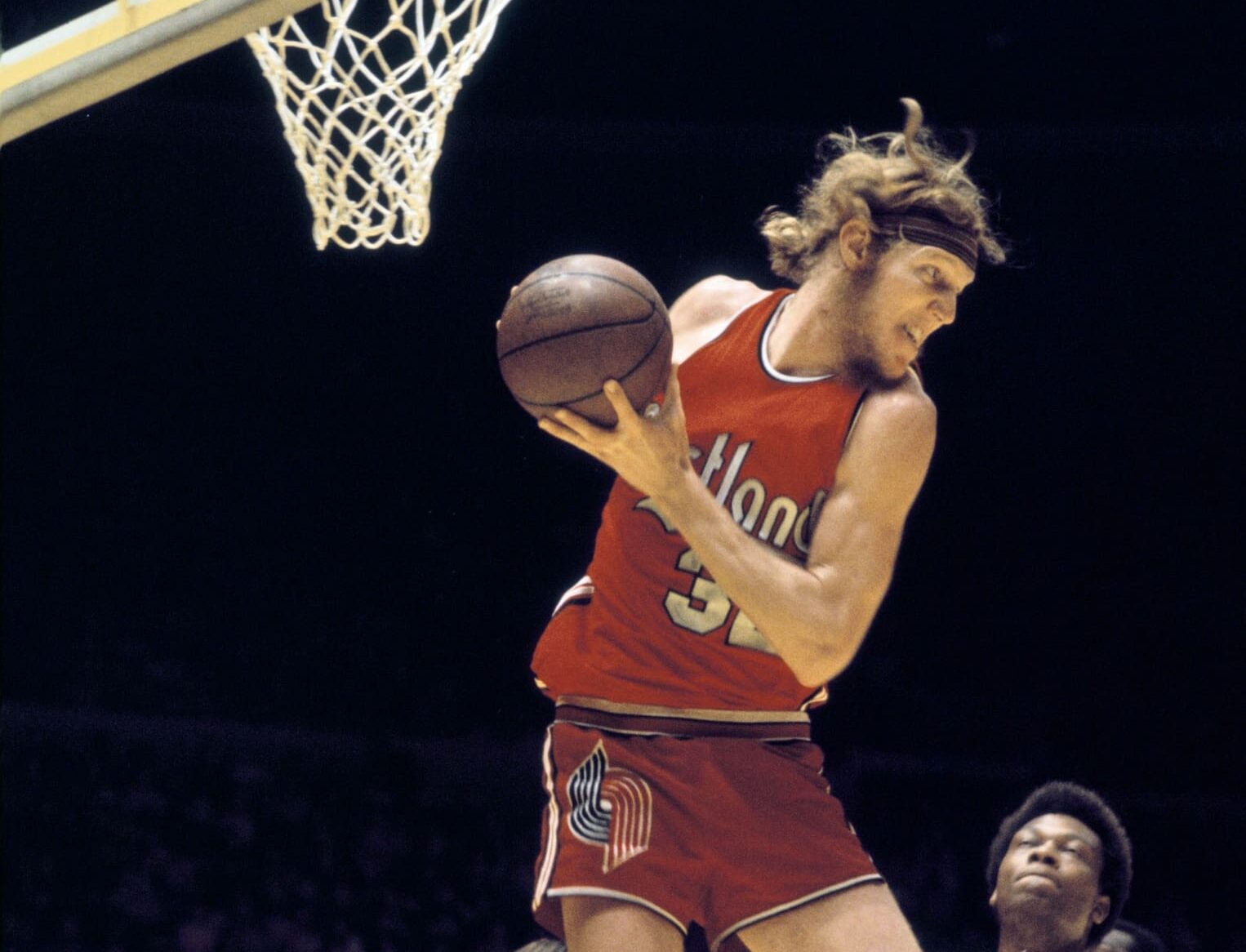 Unknown date; Los Angeles, CA, USA; FILE PHOTO; Portland Trailblazers center Bill Walton (32) pulls down a rebound against the Los Angeles Lakers at the Forum. Mandatory Credit: MPS-USA TODAY Sports