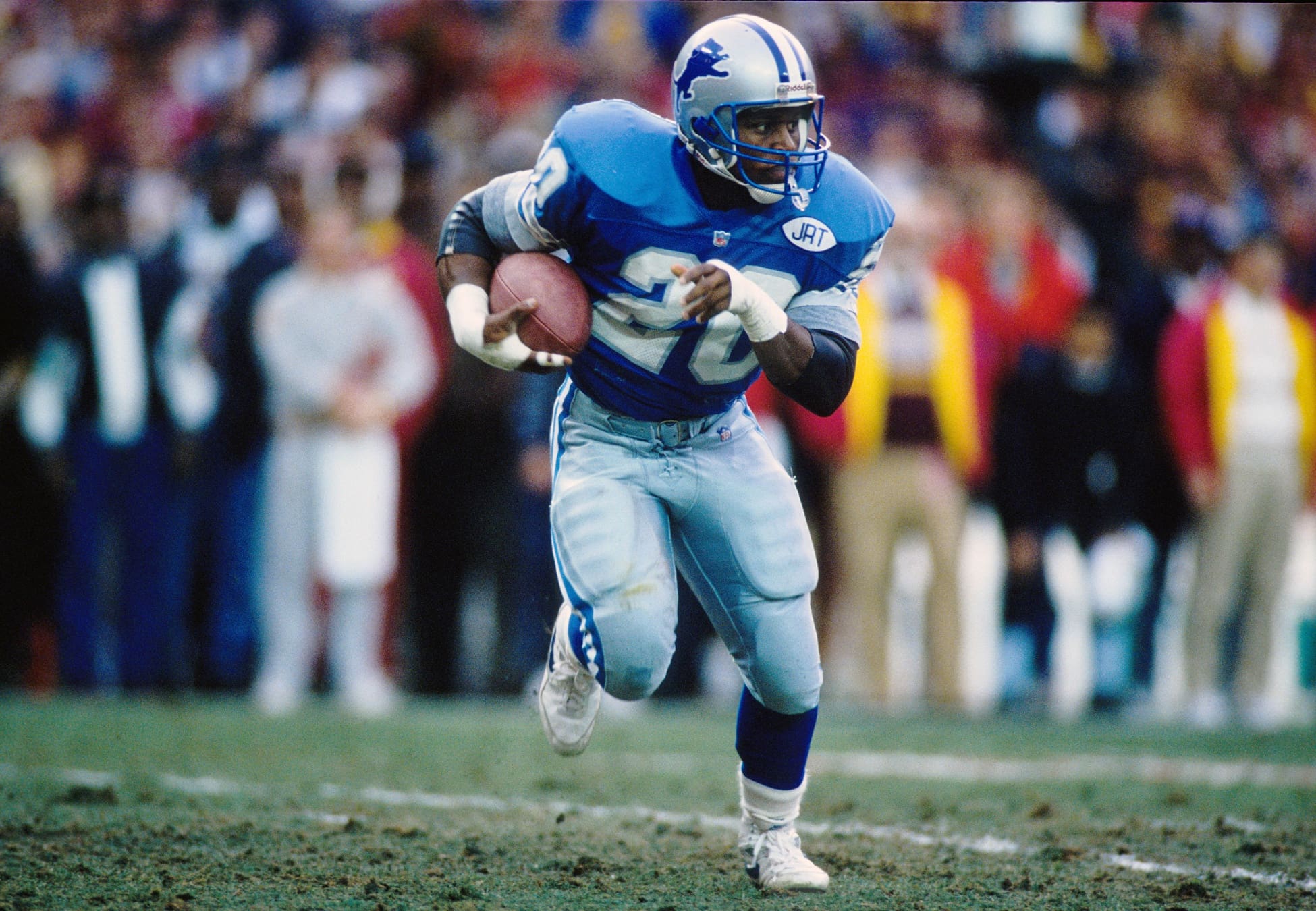 Jan 12, 1992; Washington, DC, USA; FILE PHOTO; Detroit Lions running back Barry Sanders (20) carries the ball against the Washington Redskins in the 1991 NFC Championship at RFK Stadium. The Redskins defeated the Lions 41-10. Mandatory Credit: MPS-USA TODAY Sports