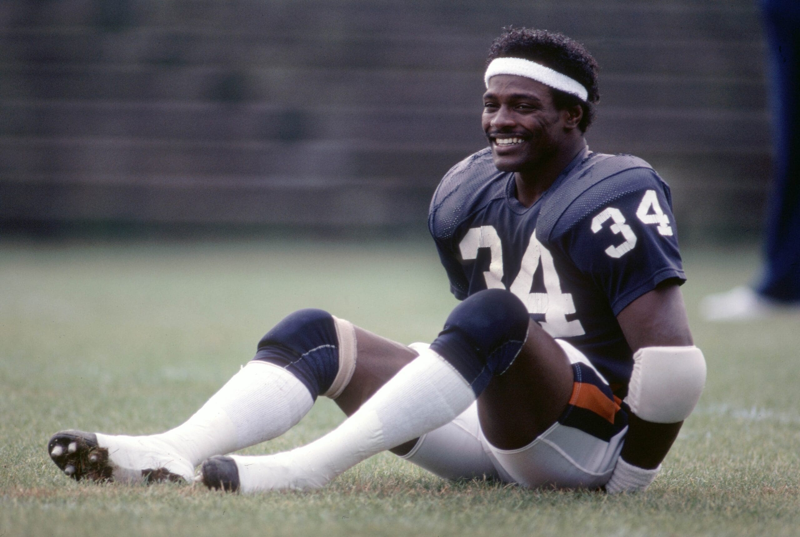 Oct 1984; Chicago, IL, USA; FILE PHOTO; Chicago Bears running back Walter Payton (34) stretches during the 1984 season. Mandatory Credit: USA TODAY Sports
