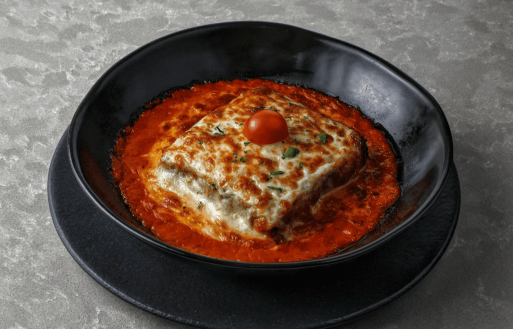 A gooey lasagna layered inside a Dutch oven