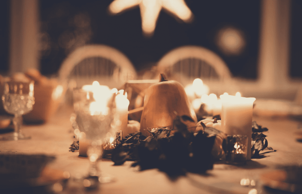 A table centerpiece made from candles and mini lights