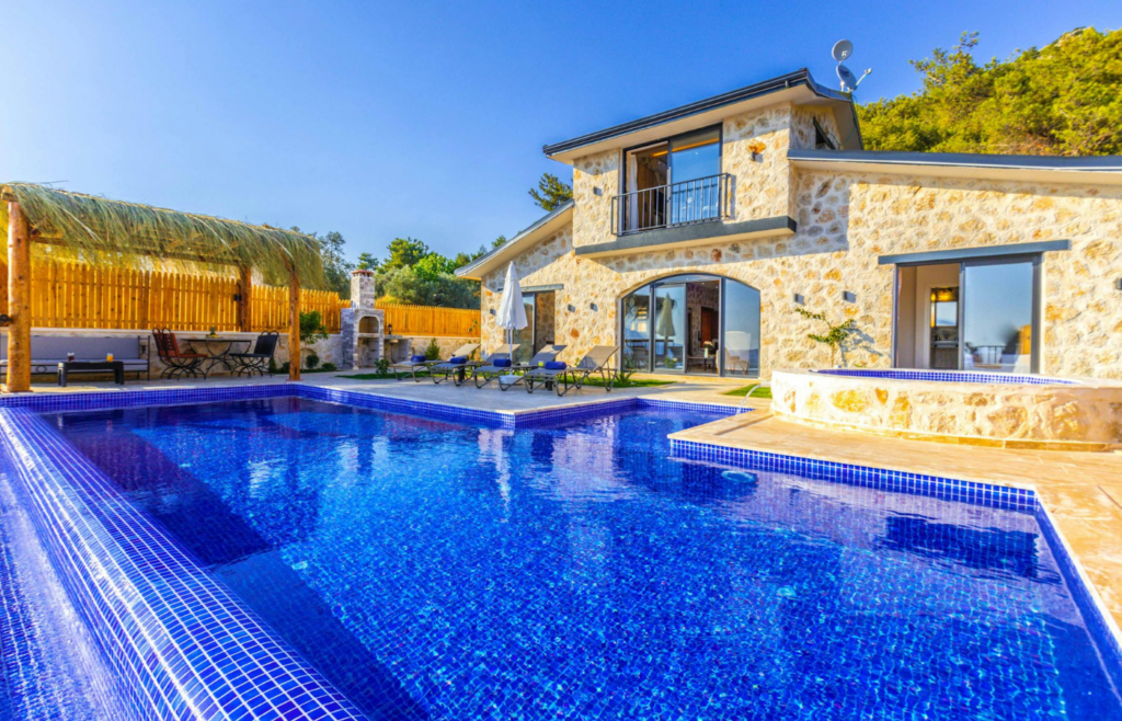 A private pool and patio at a luxury villa