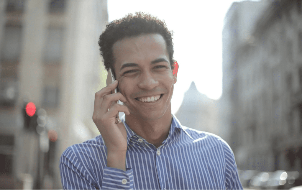 A person confidently answering a phone or message