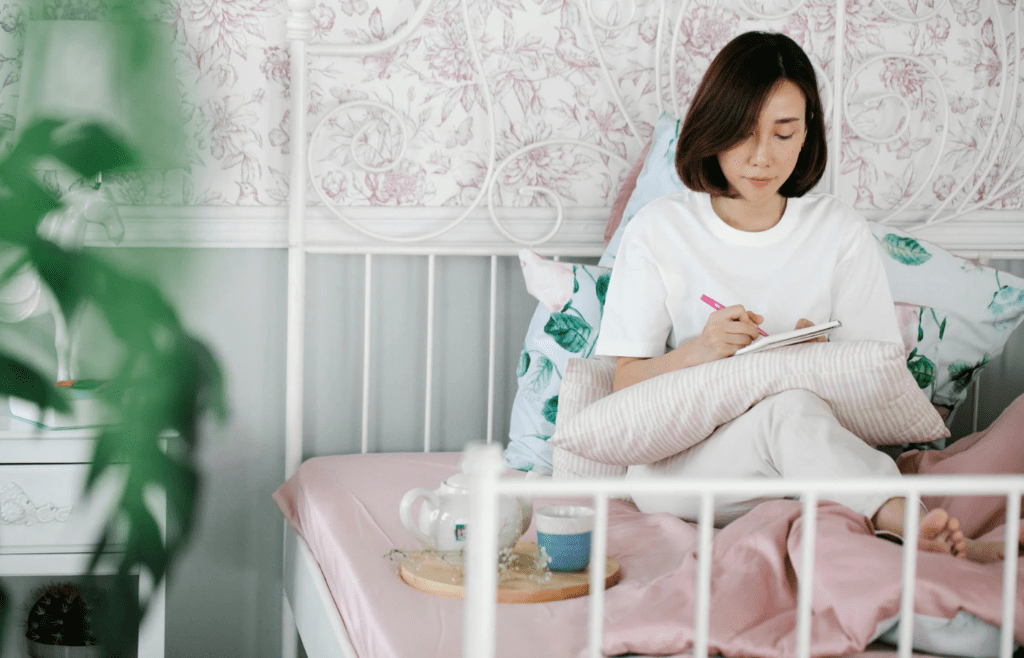 A person journaling and reflecting
